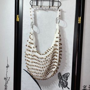 White and brown hobo bag